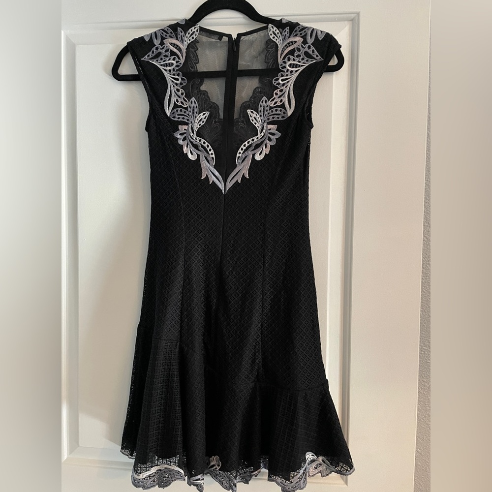 Karen Millen dress with beautiful embroidery on the neckline, back and hem.